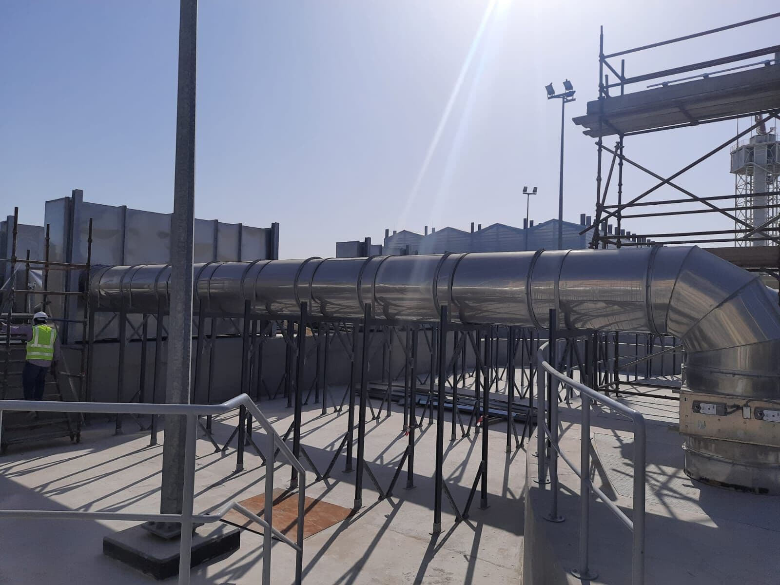 Green Square crew on the stainless duct run at Musaimeer pumping station